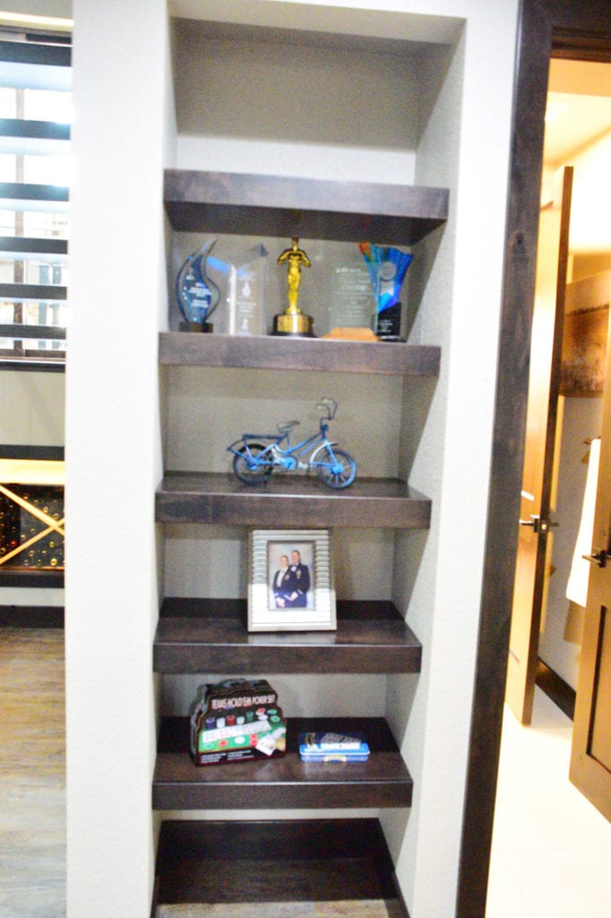 Wooden shelves filled with trinkets